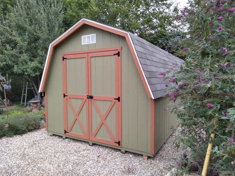 storage barn in landscaped backyard